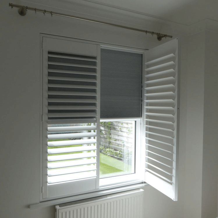 Blackout plantation shutters Hampshire with integrated blind — ideal for bedrooms