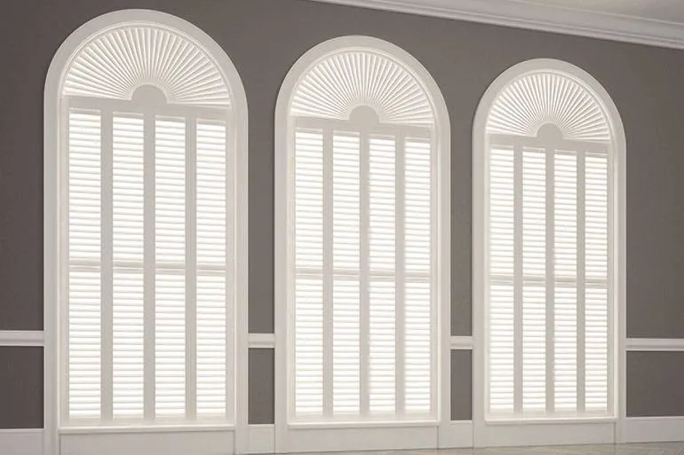 Arched sunburst plantation shutters Hampshire — bespoke special shape fitted shutters
